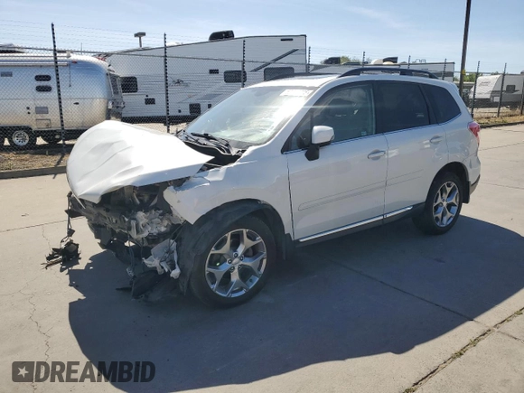 2016 Subaru Forester Touring z VIN JF2SJAXC0GH523611, wystawiony jako Copart lot #57267895 z przebiegiem 145 552 mil mil oraz Szkoda całkowita • Salvage title. Historia ofert i sprzedaży dostępna na DreamBid. Obrazek 1.