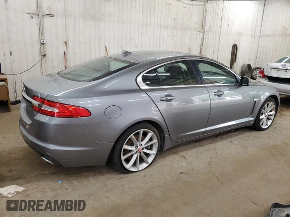 2015 Jaguar XF Portfolio with VIN SAJWJ0FF8F8U65883, listed as a Copart auction lot 55783945 with 133,431 mi miles and Salvage Title. Bid and sale history available at DreamBid. Image 3.