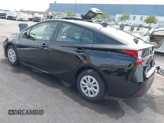 2022 Toyota Prius L Eco with VIN JTDKAMFU2N3157283, listed as a IAAI auction lot 41620334 with 59,754 mi miles. Bid and sale history available at carsss.com. Image 3.
