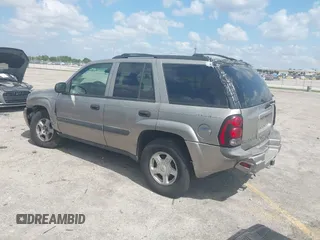 2003 Chevrolet TrailBlazer LS with VIN 1GNDT13SX32367807, listed as a IAAI auction lot 42070031 with 162,966 mi miles and . Bid and sale history available at DreamBid. Image 3.