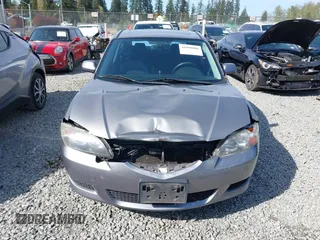 2006 Mazda 3 i with VIN JM1BK12F461530369, listed as a IAAI auction lot 41990008 with 169,878 mi miles. Bid and sale history available at carsss.com. Image 12.