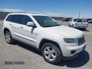 2012 Jeep Grand Cherokee Laredo with VIN 1C4RJEAG0CC210274, listed as a IAAI auction lot 42099944 with 177,527 mi miles. Bid and sale history available at carsss.com. Image 1.