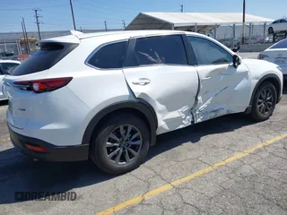 2020 Mazda CX-9 Sport with VIN JM3TCABY1L0406720, listed as a IAAI auction lot 42304144 with 75,887 mi miles and . Bid and sale history available at DreamBid. Image 4.