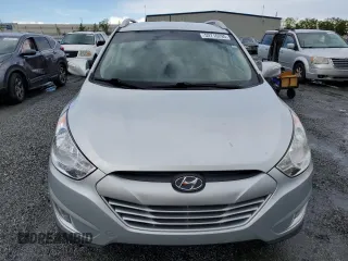 2013 Hyundai Tucson GLS with VIN KM8JU3AC1DU709937, listed as a Copart auction lot 52716295 with 181,711 mi miles and Salvage Title. Bid and sale history available at carsss.com. Image 5.