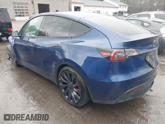 2021 Tesla Model Y Performance with VIN 5YJYGDEF5MF257262, listed as a IAAI auction lot 41721311 with 31,329 mi miles and . Bid and sale history available at DreamBid. Image 3.