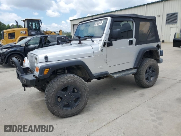 2005 Jeep Wrangler X with VIN 1J4FA39S55P353789, listed as a Copart auction lot 62469015 with 143,817 mi miles and Salvage title. Bid and sale history available at DreamBid. Image 1.