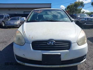 2009 Hyundai Accent Auto GLS with VIN KMHCN46C19U368700, listed as a IAAI auction lot 41590180 with 165,836 mi miles. Bid and sale history available at carsss.com. Image 12.