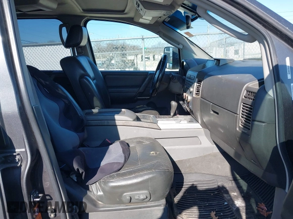 2005 Nissan Titan SE with VIN 1N6BA07B15N569959, listed as a IAAI auction lot 41389671 with 188,335 mi miles and . Bid and sale history available at DreamBid. Image 5.