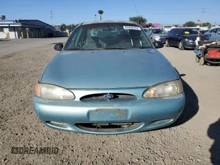 1999 Ford Escort SE with VIN 1FAFP13P5XW177449, listed as a Copart auction lot 82600344 with 237,019 mi miles and Salvage Title. Bid and sale history available at carsss.com. Image 5.