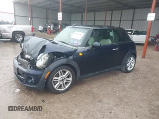 2013 MINI Convertible with VIN WMWZN3C53DT135492, listed as a IAAI auction lot 41436703 with 79,408 mi miles and . Bid and sale history available at DreamBid. Image 17.