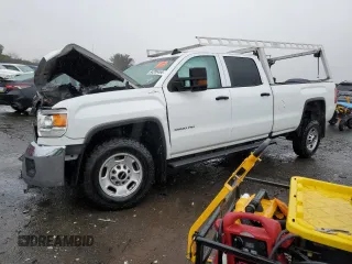 2018 GMC Sierra 2500HD z VIN 1GT12REG1JF126729, wystawiony jako Copart lot #84289454 z przebiegiem Nie podano mil oraz Szkoda całkowita • Salvage title. Historia ofert i sprzedaży dostępna na DreamBid. Obrazek 1.