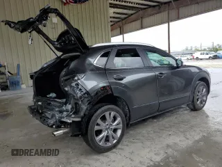 2023 Mazda CX-30 S Carbon Edition with VIN 3MVDMBCM9PM506691, listed as a Copart auction lot 55864895 with 21,441 mi miles and Salvage title. Bid and sale history available at DreamBid. Image 3.