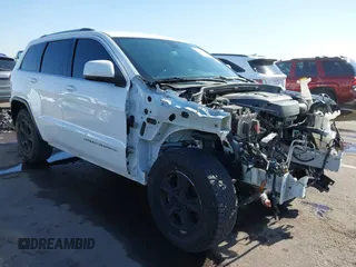 2016 Jeep Grand Cherokee Laredo z VIN 1C4RJEAG2GC386684, wystawiony jako IAAI lot #41915889 z przebiegiem 100 473 mil mil oraz . Historia ofert i sprzedaży dostępna na DreamBid. Obrazek 1.