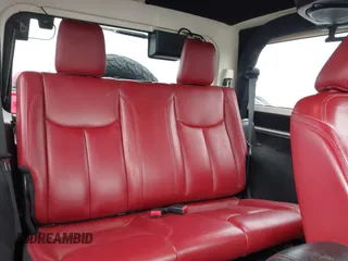 2013 Jeep Wrangler Rubicon 10th Anniversary with VIN 1C4BJWCG2DL651815, listed as a IAAI auction lot 41643919 with 98,297 mi miles and . Bid and sale history available at DreamBid. Image 8.