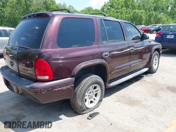 2003 Dodge Durango SLT Plus z VIN 1D4HS58N03F586049, wystawiony jako IAAI lot #42154236 z przebiegiem 253 727 mil mil oraz . Historia ofert i sprzedaży dostępna na DreamBid. Obrazek 4.