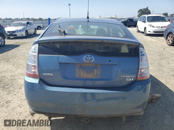 2006 Toyota Prius z VIN JTDKB20U167517552, wystawiony jako Copart lot #59218575 z przebiegiem Nie podano mil oraz Szkoda całkowita • Salvage title. Historia ofert i sprzedaży dostępna na DreamBid. Obrazek 6.