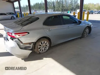 2020 Toyota Camry LE with VIN 4T1C11AKXLU381686, listed as a IAAI auction lot 42013767 with 32,603 mi miles. Bid and sale history available at carsss.com. Image 4.