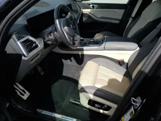 2024 BMW X7 M60i with VIN 5UX33EM04R9S50411, listed as a Copart auction lot 76962074 with 0 mi miles and Salvage Title. Bid and sale history available at carsss.com. Image 7.