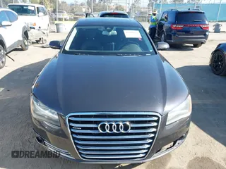 2011 Audi A8 with VIN WAURVAFD9BN014362, listed as a IAAI auction lot 41960366 with 135,244 mi miles and . Bid and sale history available at DreamBid. Image 12.