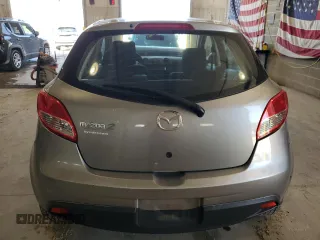 2013 Mazda 2 Sport z VIN JM1DE1KY9D0170567, wystawiony jako Copart lot #56267185 z przebiegiem 132 151 mil mil oraz Szkoda całkowita • Salvage title. Historia ofert i sprzedaży dostępna na DreamBid. Obrazek 6.