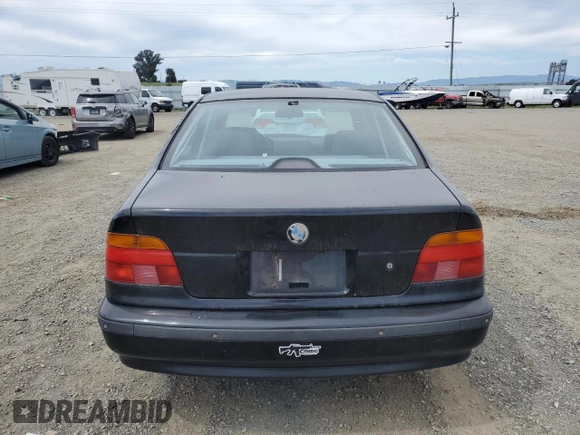 2000 BMW 5 Series z VIN WBADM5341YBY17346, wystawiony jako Copart lot #52618955 z przebiegiem 268 792 mil mil oraz Szkoda całkowita • Salvage title. Historia ofert i sprzedaży dostępna na DreamBid. Obrazek 6.