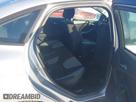 2012 Ford Focus SE with VIN 1FAHP3F27CL457213, listed as a IAAI auction lot 41303904 with 215,044 mi miles and . Bid and sale history available at DreamBid. Image 8.