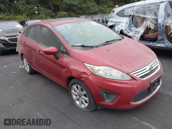 2012 Ford Fiesta SE with VIN 3FADP4BJ1CM145114, listed as a IAAI auction lot 40446295 with 169,529 mi miles. Bid and sale history available at carsss.com. Image 1.