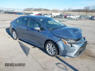 2023 Toyota Corolla Hybrid LE with VIN JTDBCMFEXPJ014034, listed as a IAAI auction lot 41865829 with 33,210 mi miles and . Bid and sale history available at carsss.com. Image 1.