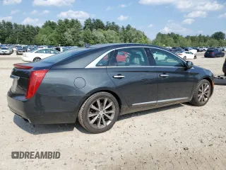 2013 Cadillac XTS Luxury with VIN 2G61P5S34D9212029, listed as a Copart auction lot 61874985 with 145,762 mi miles and Clean title. Bid and sale history available at DreamBid. Image 3.