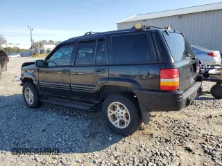 1997 Jeep Grand Cherokee Limited with VIN 1J4GZ78Y1VC598820, listed as a Copart auction lot 46398505 with 259,241 mi miles and Salvage Title. Bid and sale history available at carsss.com. Image 2.