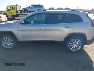 2015 Jeep Cherokee Limited with VIN 1C4PJMDB7FW610031, listed as a IAAI auction lot 41781285 with 51,913 mi miles. Bid and sale history available at carsss.com. Image 14.