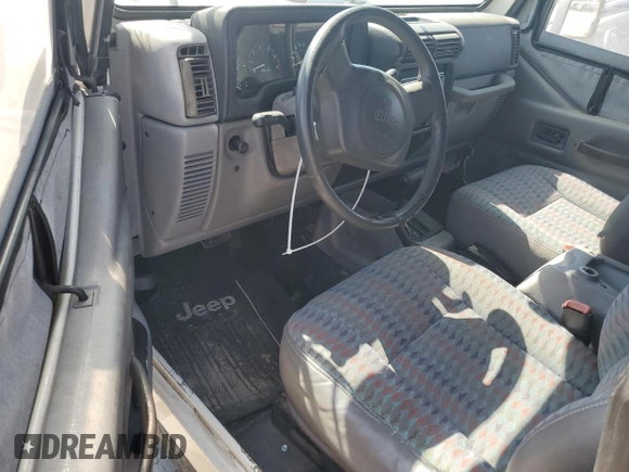 1997 Jeep Wrangler SE with VIN 1J4FY29PXVP411817, listed as a Copart auction lot 48755615 with 125,284 mi miles and Salvage Title. Bid and sale history available at DreamBid. Image 8.