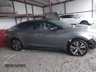 2016 Nissan Maxima SL with VIN 1N4AA6AP2GC379971, listed as a IAAI auction lot 41712080 with 192,382 mi miles and . Bid and sale history available at DreamBid. Image 13.