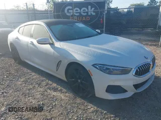2022 BMW 8 Series 840i with VIN WBAGV2C01NCJ90613, listed as a IAAI auction lot 41997214 with 28,014 mi miles. Bid and sale history available at carsss.com. Image 1.