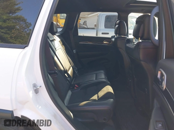 2017 Jeep Grand Cherokee Trailhawk with VIN 1C4RJFLG2HC670868, listed as a IAAI auction lot 42711041 with 129,465 mi miles and . Bid and sale history available at DreamBid. Image 8.