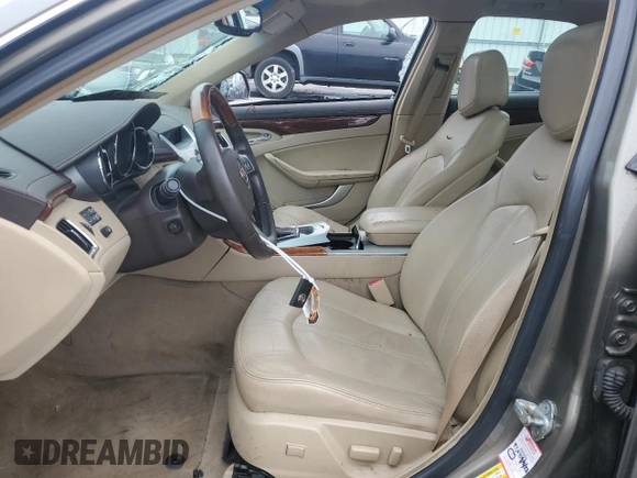 2010 Cadillac CTS Premium with VIN 1G6DS5EV3A0116911, listed as a Copart auction lot 57394905 with 126,084 mi miles and Salvage title. Bid and sale history available at DreamBid. Image 7.