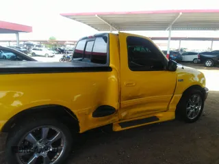 2002 Ford F-150 XL with VIN 1FTRF07L52KB68889, listed as a IAAI auction lot 39266273 with 84,900 mi miles and . Bid and sale history available at DreamBid. Image 6.