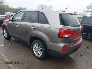 2014 Kia Sorento LX with VIN 5XYKT3A67EG477367, listed as a IAAI auction lot 41911249 with 172,320 mi miles and . Bid and sale history available at DreamBid. Image 3.