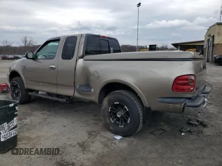 2002 Ford F-150 XL with VIN 1FTRX08L12KA41875, listed as a Copart auction lot 64756525 with 221,793 mi miles and Non repairable. Bid and sale history available at DreamBid. Image 2.
