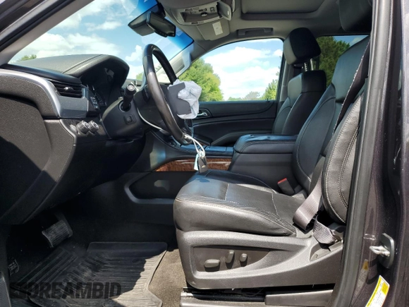 2015 Chevrolet Tahoe LTZ with VIN 1GNSKCKC9FR698924, listed as a Copart auction lot 56196895 with 184,740 mi miles and Salvage title. Bid and sale history available at DreamBid. Image 7.