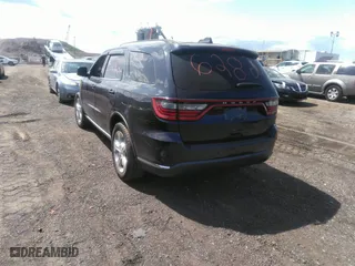 2014 Dodge Durango Limited with VIN 1C4RDJDG3EC585865, listed as a IAAI auction lot 40136282 with 68,046 mi miles. Bid and sale history available at carsss.com. Image 3.