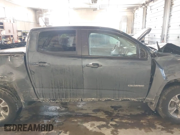 2019 Chevrolet Colorado 4WD Z71 z VIN 1GCGTDEN9K1299292, wystawiony jako IAAI lot #41626944 z przebiegiem 84 949 mil mil oraz . Historia ofert i sprzedaży dostępna na DreamBid. Obrazek 13.
