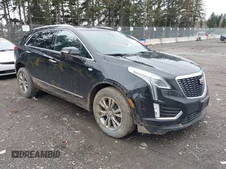 2021 Cadillac XT5 AWD Premium Luxury with VIN 1GYKNDRS3MZ119601, listed as a IAAI auction lot 41614239 with 107,263 mi miles. Bid and sale history available at carsss.com. Image 1.
