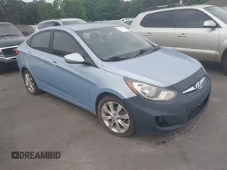2013 Hyundai Accent GLS with VIN KMHCU4AE8DU583303, listed as a IAAI auction lot 42504235 with 113,992 mi miles and . Bid and sale history available at DreamBid. Image 1.