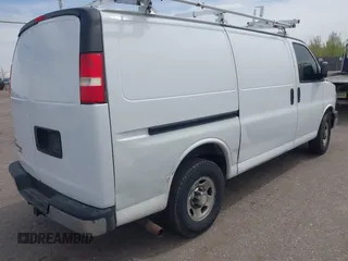 2012 Chevrolet Express Cargo Van with VIN 1GCWGFCA7C1121989, listed as a IAAI auction lot 42118853 with 214,478 mi miles. Bid and sale history available at carsss.com. Image 4.