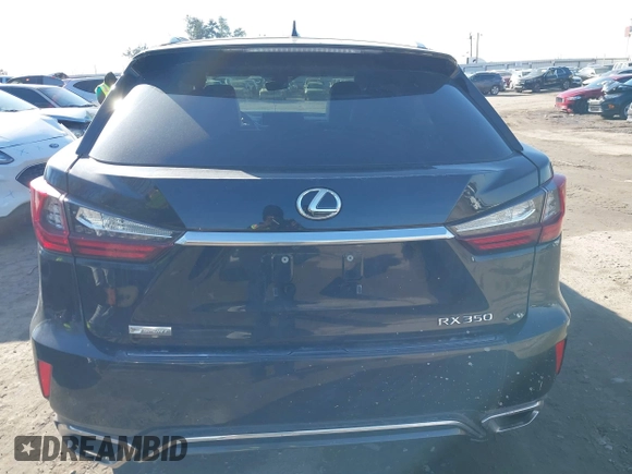 2016 Lexus RX 350 with VIN 2T2BZMCA2GC049142, listed as a IAAI auction lot 41453409 with 103,760 mi miles and . Bid and sale history available at DreamBid. Image 15.