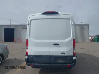 2020 Ford Transit Cargo with VIN 1FTBR2CG1LKB43034, listed as a IAAI auction lot 41668193 with 56,827 mi miles and . Bid and sale history available at DreamBid. Image 16.