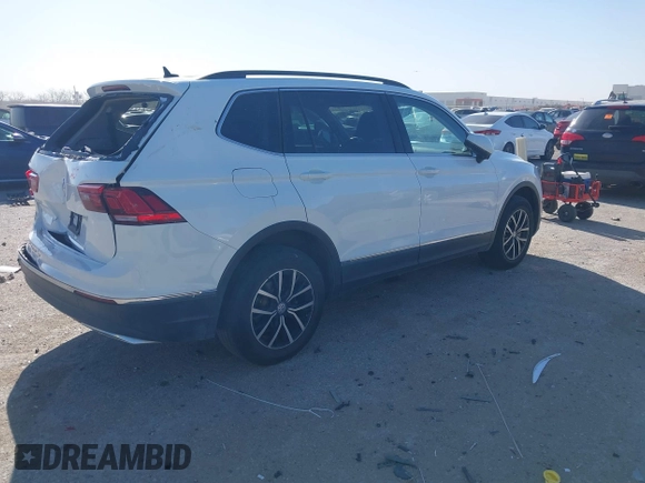 2021 Volkswagen Tiguan SE with VIN 3VV3B7AX9MM051920, listed as a IAAI auction lot 41826721 with 127,699 mi miles and . Bid and sale history available at DreamBid. Image 4.