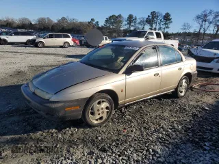 1997 Saturn SL with VIN 1G8ZH5286VZ225732, listed as a Copart auction lot 87618845 with 227,973 mi miles and Salvage Title. Bid and sale history available at carsss.com. Image 1.
