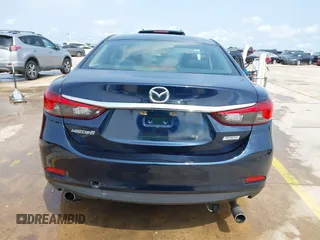 2015 Mazda 6 i Sport with VIN JM1GJ1U52F1201571, listed as a IAAI auction lot 42096344 with 88,290 mi miles and . Bid and sale history available at DreamBid. Image 16.